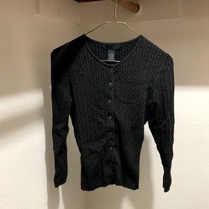 Black button-up sweater.